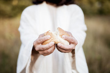 Jesus breaking bread 