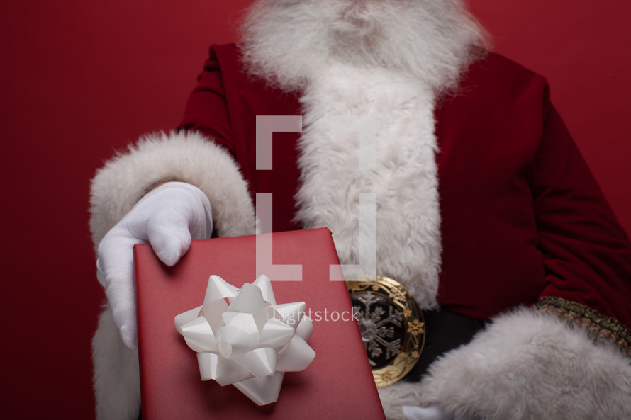 Santa giving a Christmas gift 