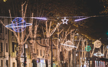 Illuminated Christmas decorations and trees in the street