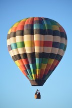 hot air balloon against a blue sky 