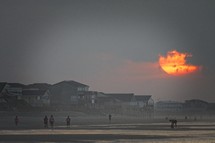 Early morning sun through clouds, Ocean Isle Beach, North Carolina.
