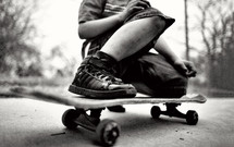 legs on a teen boy on a skateboard