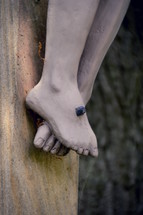 feet nailed to the cross 