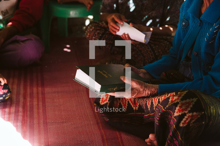 woman holding a Bible in Myanmar