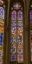 biblical scenes on colorful stained glass Montpellier church