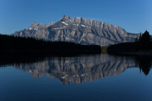 reflection of a mountain on lake water 