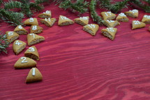 advent cookies on red wood 
