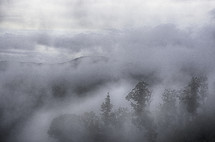 fog and clouds over mountains 