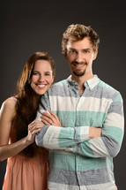 young couple posing for a portrait 
