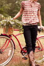woman and a vintage bicycle 