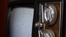 Channel surfing the old fashioned way on a vintage TV