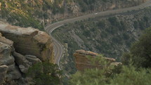 A car passing on a curvy mountain road