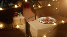 Cookies under christmas tree in the night