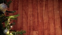 Christmas tree with wooden wall in the background 