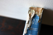 torn spine of an old well loved Bible 