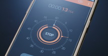 Digital timer counting on a smartphone screen
