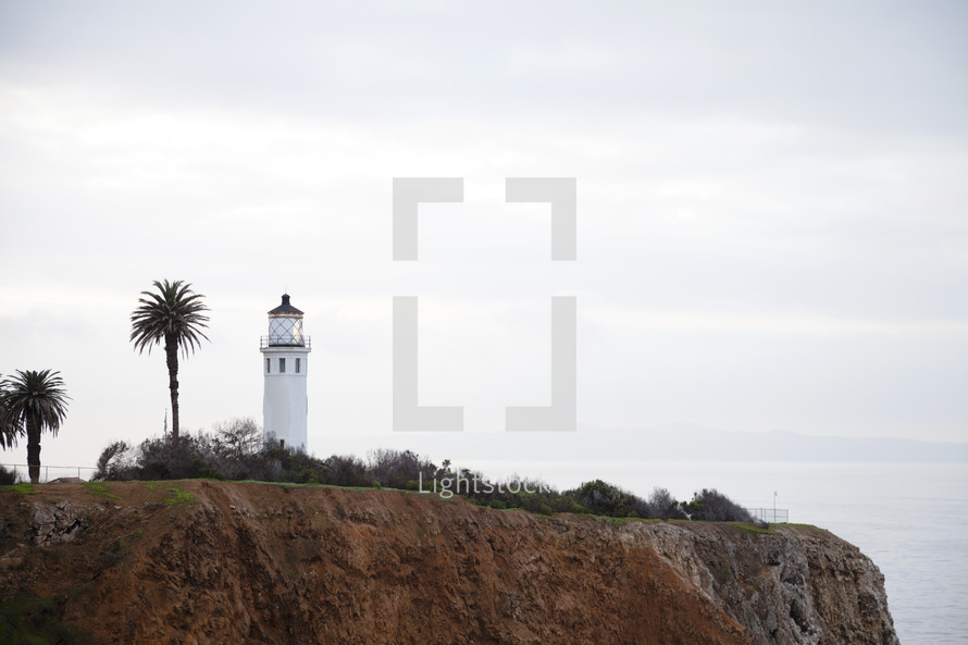 lighthouse and sea cliffs 