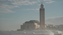 Mosquée Hassan II Mosque and The Ocean Sea Beach Waves in Slow Motion from Maritime Promenade Casablanca, Morocco