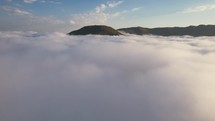 The peak above the clouds