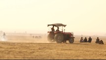 tractor in a desert 