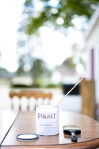 can of paint on a table 