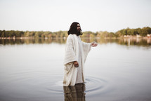 Jesus standing in water