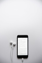 Bible app and earbuds 