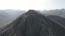 Drone footage of mountain tops in Glencoe, Scotland.