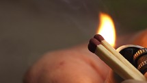 Matches ignited and its flame shot in slow motion.