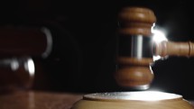 Banging A Gavel on the table 