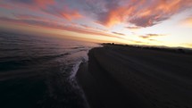 Sea view of a coast with a sunrise sky 
