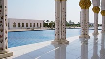 Swimming pool with blue water and white marble