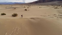 person hiking in a desert 
