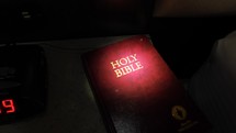 A Gideon Bible in a hotel room