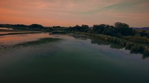 Romantic sunrise over the lake 