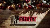 Merry Christmas sign with decorations background 