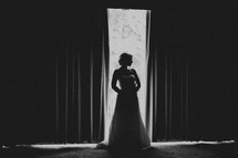 A profile of a bride and her dress