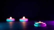 Colorful Diwali Candles on Black Background 