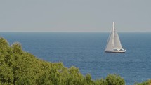 Sailboat sails in the sea