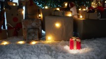 Symbolic Christmas gift under tree