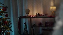 Christmas home decorations with blurred Santa Claus 