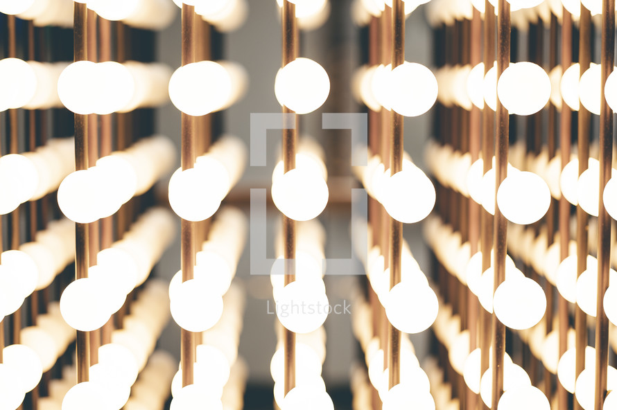 rows of lightbulbs and mirror reflection background 