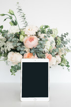 iPad and bouquet of flowers 