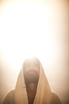 glowing Jesus looking up 