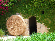 The Empty tomb of Jesus with the stone rolled away