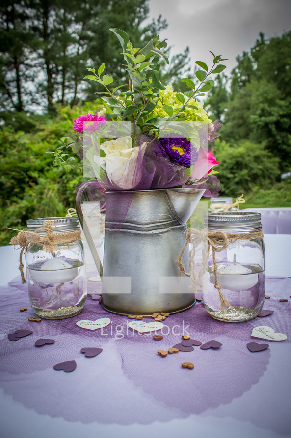 flower arrangement on a table at a wedding reception 