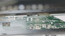 SMT machine places resistors, capacitors, transistors, LED and integrated circuits on circuit boards at high speed