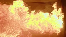 Slow motion of a burning fire with large raging flames