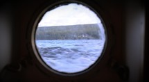 Land scene from the window of a ship