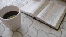 coffee and an opened Bible 